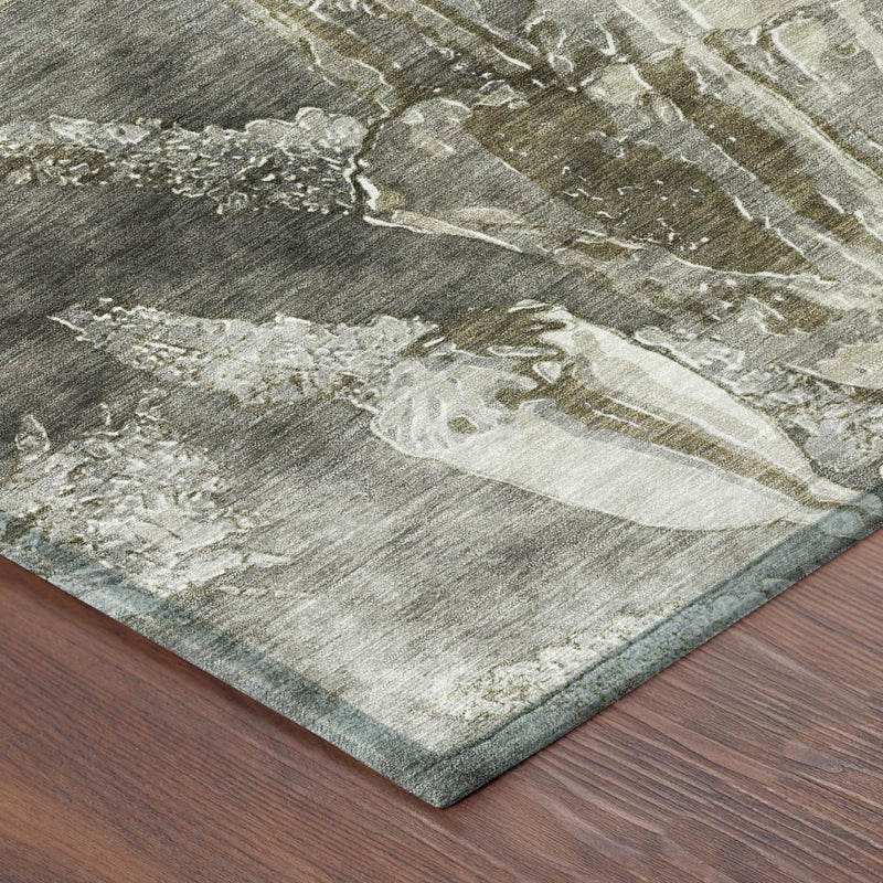 Rectangular area rug corner with distressed floral botanical pattern in pewter and gray