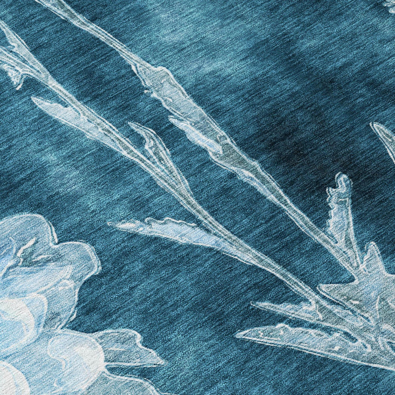 Teal textured rug with pale blue botanical line art and blossoms