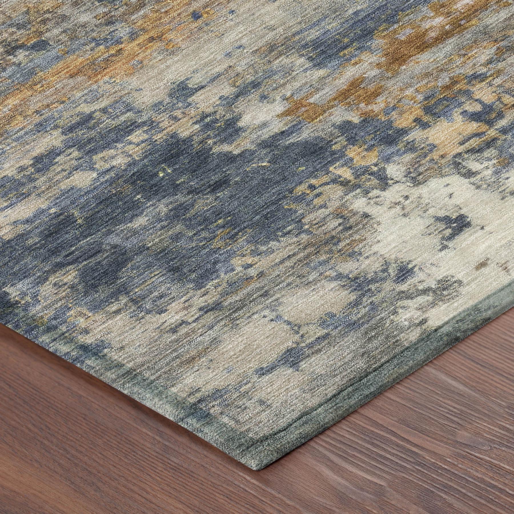 Abstract blue and gold area rug with a soft texture, featuring a contemporary design, perfect for modern home decor.
