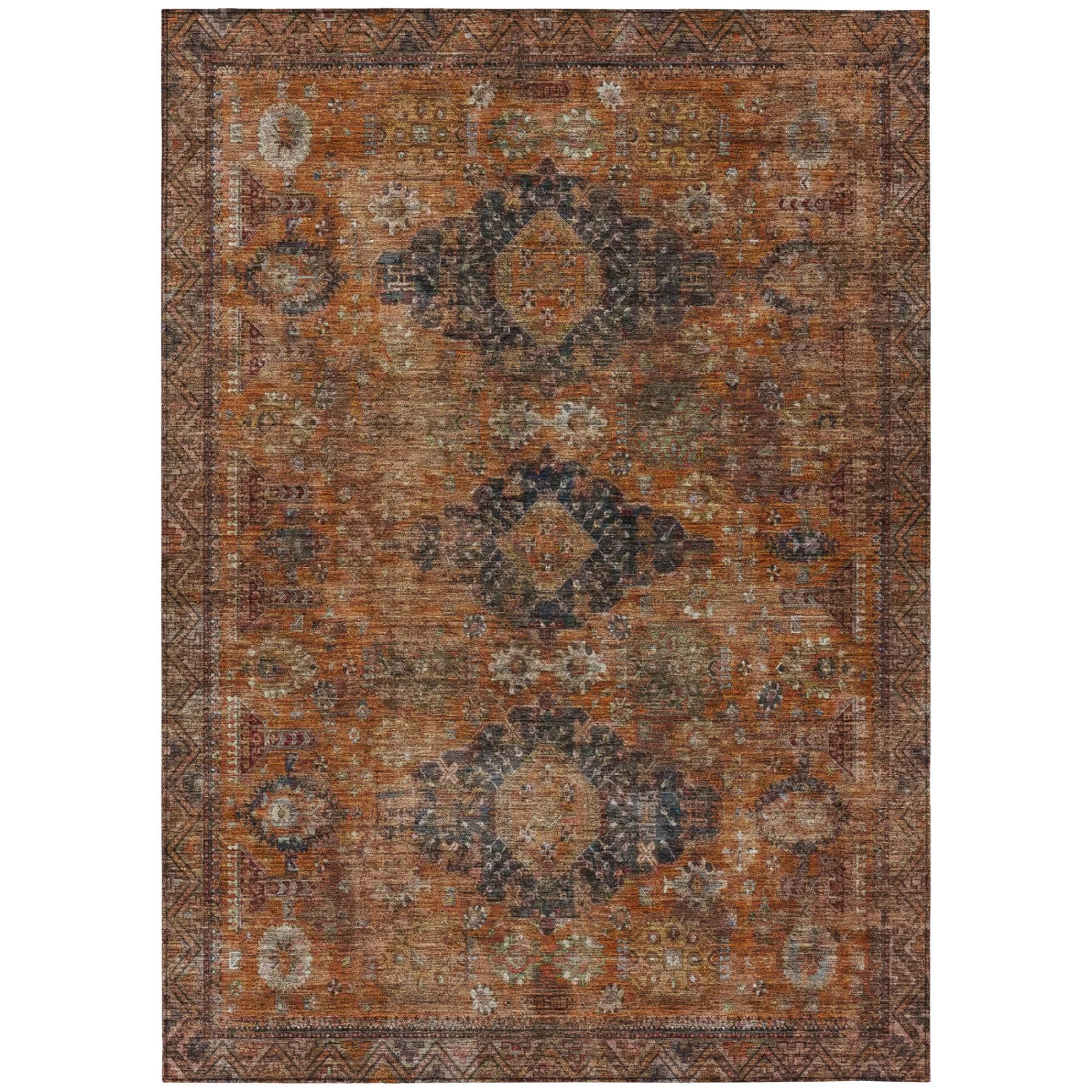 Vintage-style area rug in rust, navy, and cream with intricate floral patterns and a soft, durable texture.