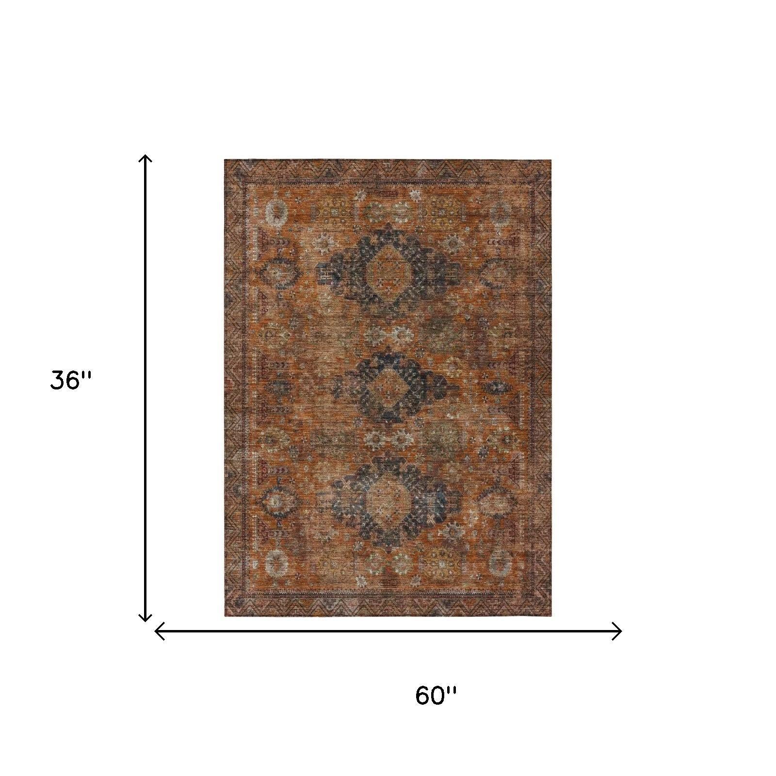 Vintage-style brown and orange area rug, 60x36 inches, featuring intricate floral patterns and geometric designs.