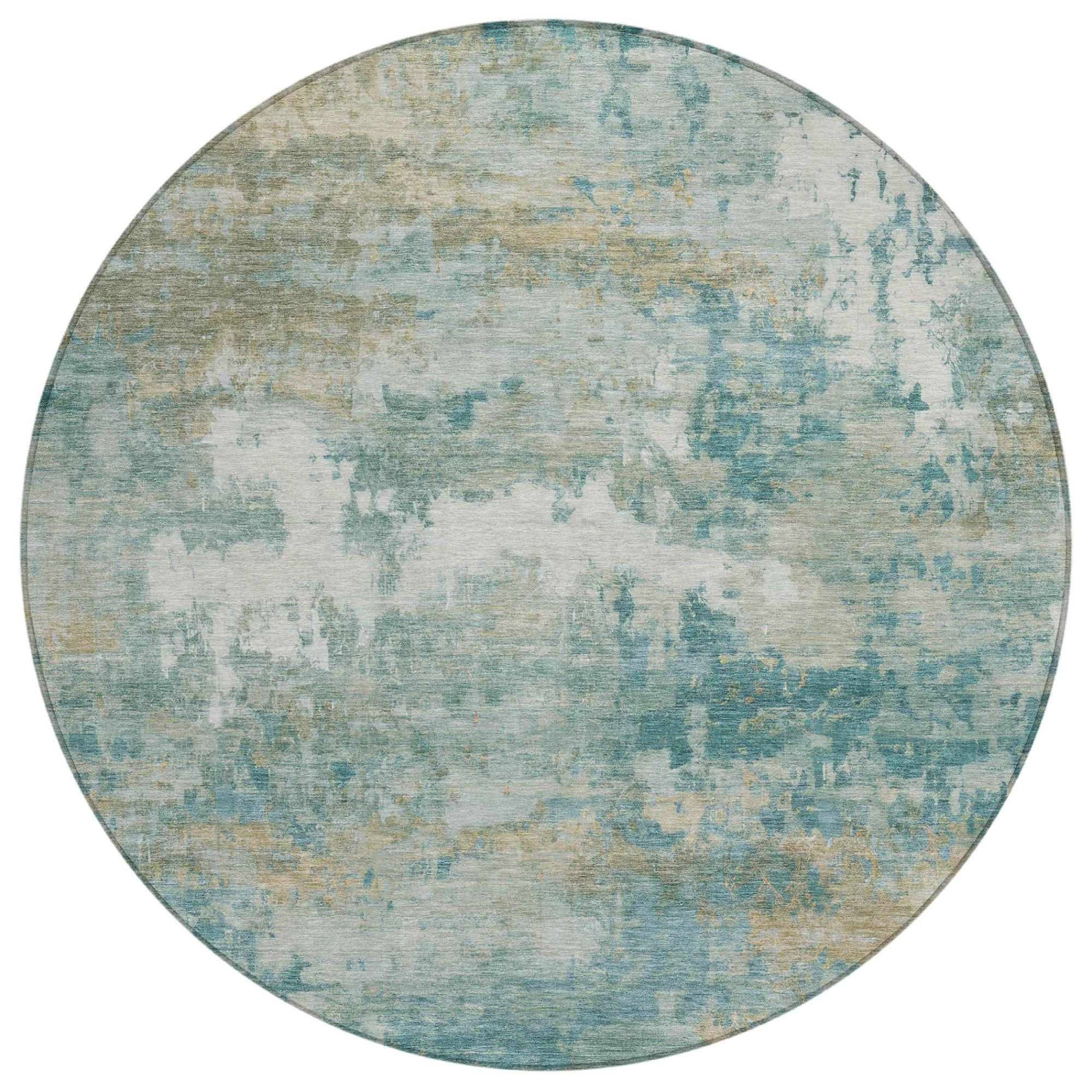 Round area rug in soft blue and green hues with a distressed texture, perfect for modern or coastal decor.