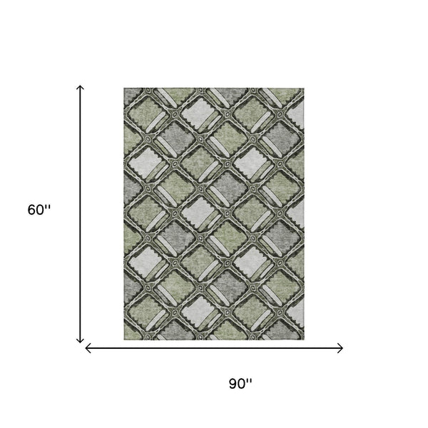 Sage and green geometric area rug with interlocking lattice pattern
