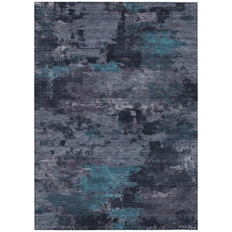 Rectangular abstract area rug in teal blue and graphite with textured finish.