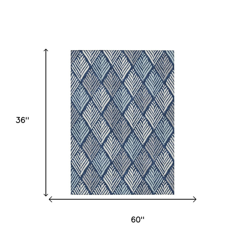 Blue geometric area rug size 60 x 36 in, navy and light blue pattern