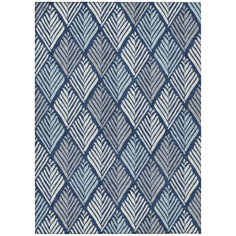 Rectangular area rug with navy and light blue geometric pattern on blue ground