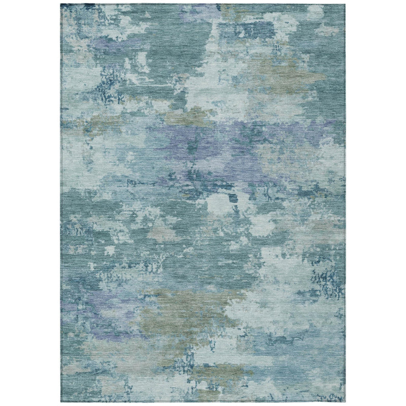 Rectangular teal blue and silver abstract area rug with distressed patch pattern