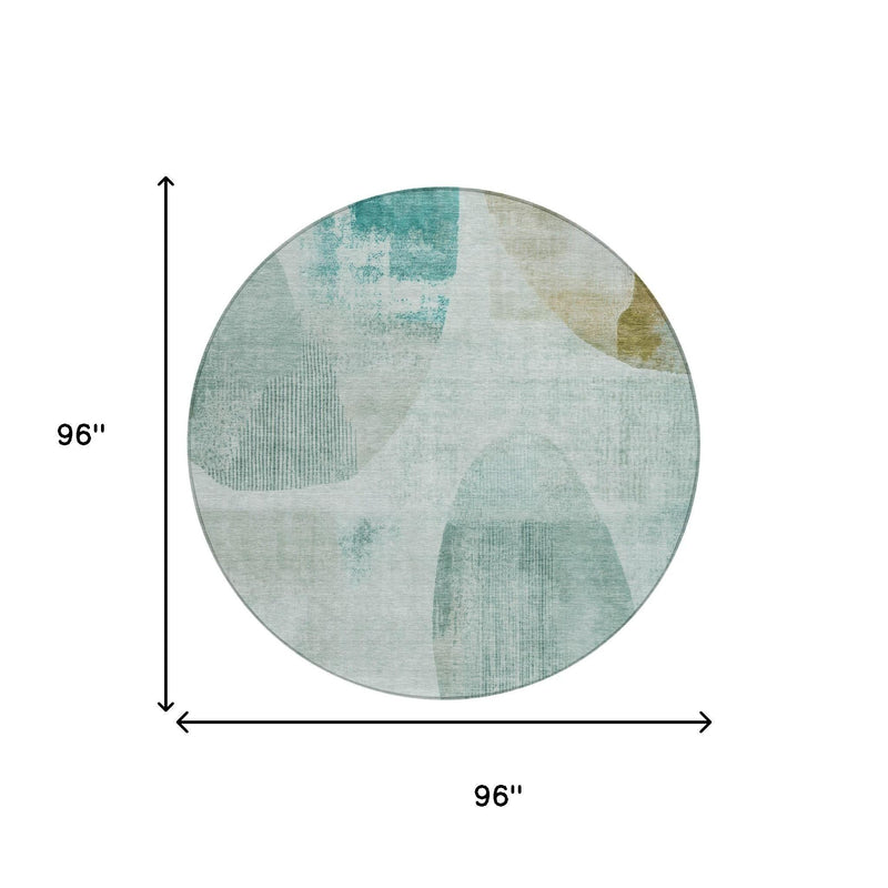 Round rug, 96 in diameter, teal blue and off-white abstract geometric pattern.