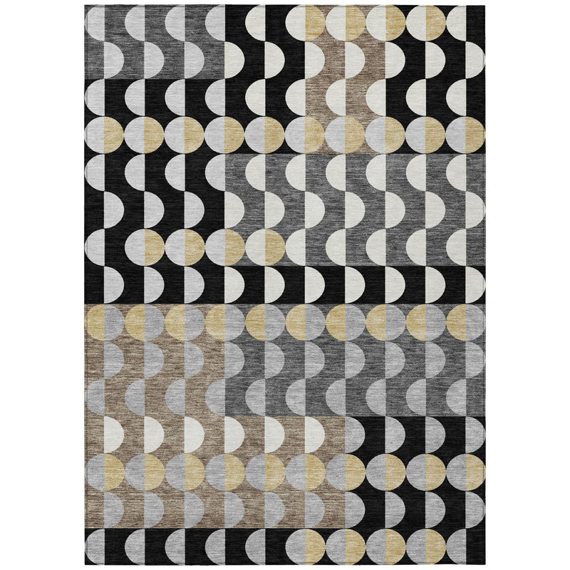 Geometric area rug with repeating circle shapes in black, gray, off-white, and gold