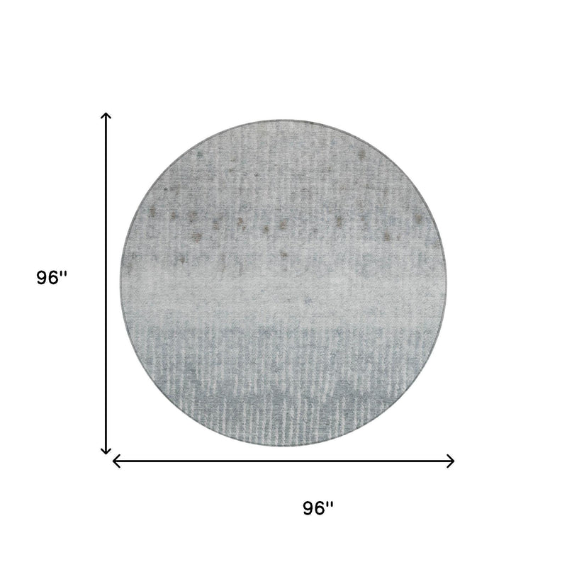 96-inch round abstract rug in cool gray with thin textured pattern