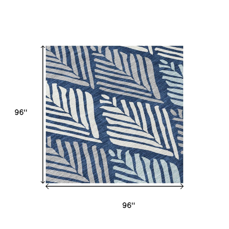 Round rug dimensions 96 in by 96 in, navy and light-blue geometric leaf design