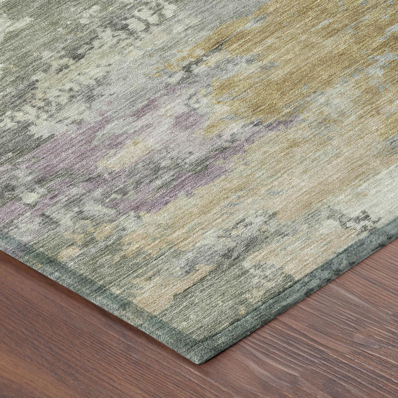 Rug corner with distressed abstract pattern in sage green, light gray, purple, and gold