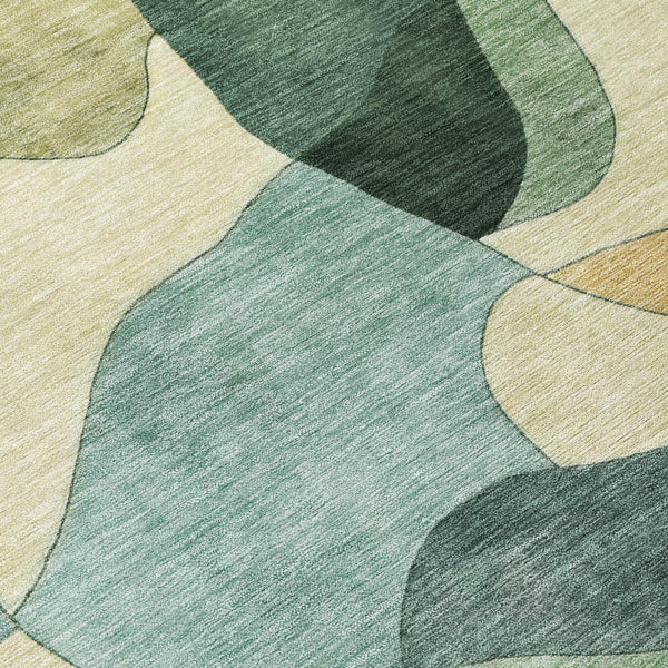 Rectangular indoor-outdoor area rug with abstract green and beige shapes