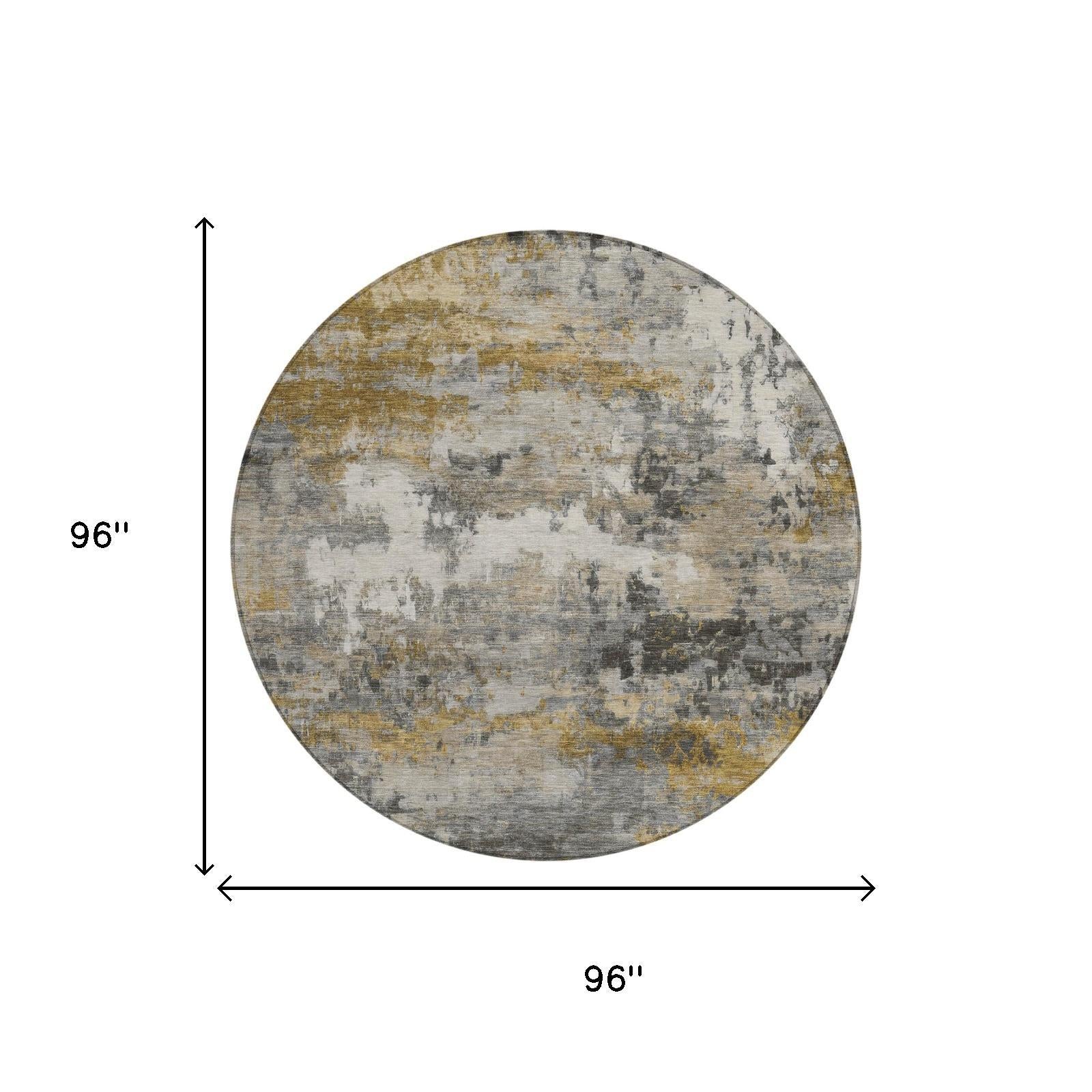 Round 96" area rug in muted gray and gold tones with a textured, modern abstract design.