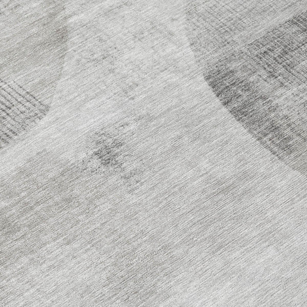 Taupe-and-brown geometric area rug with abstract ovals and blocks on light gray base