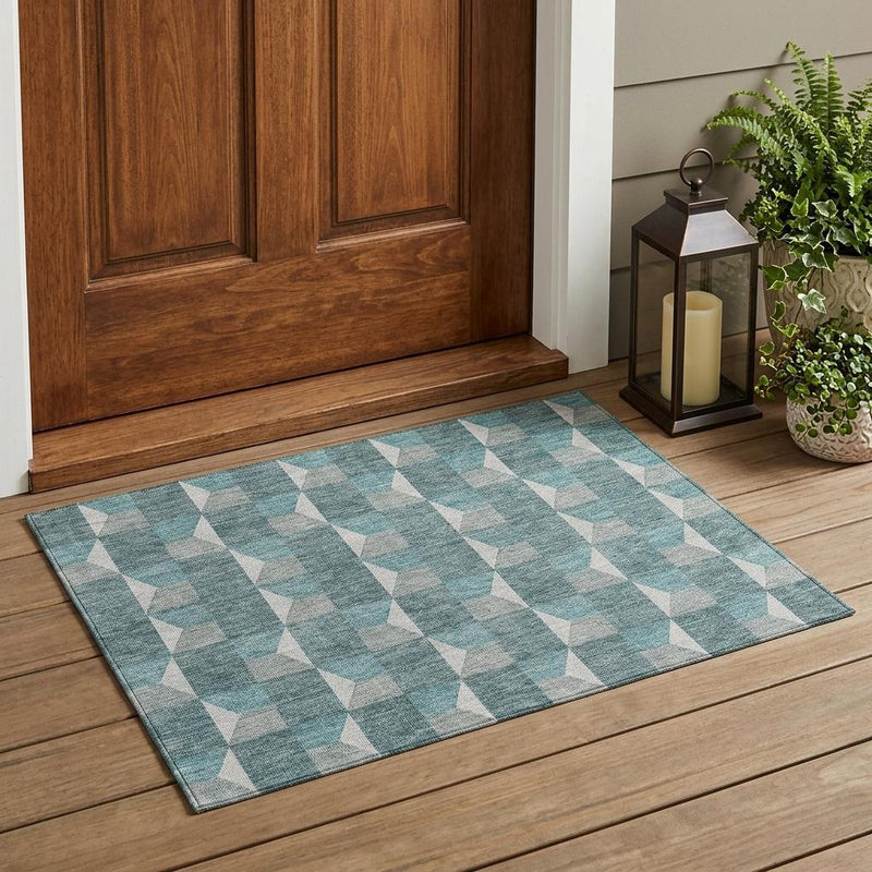 Teal and gray geometric area rug with white diamond shapes, rectangular layout
