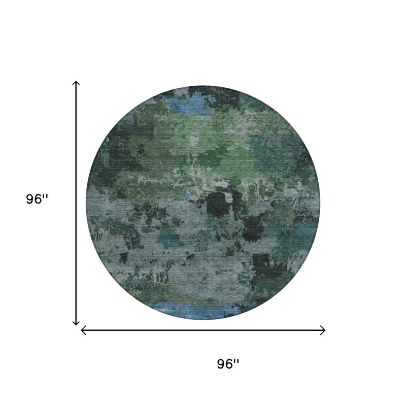 Round abstract area rug with distressed green, gray, and blue design, 96 in diameter