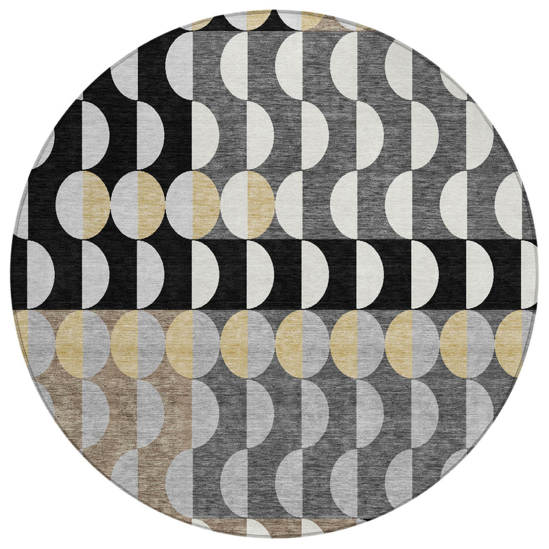Round geometric area rug with repeating black and gray arcs and gold accents