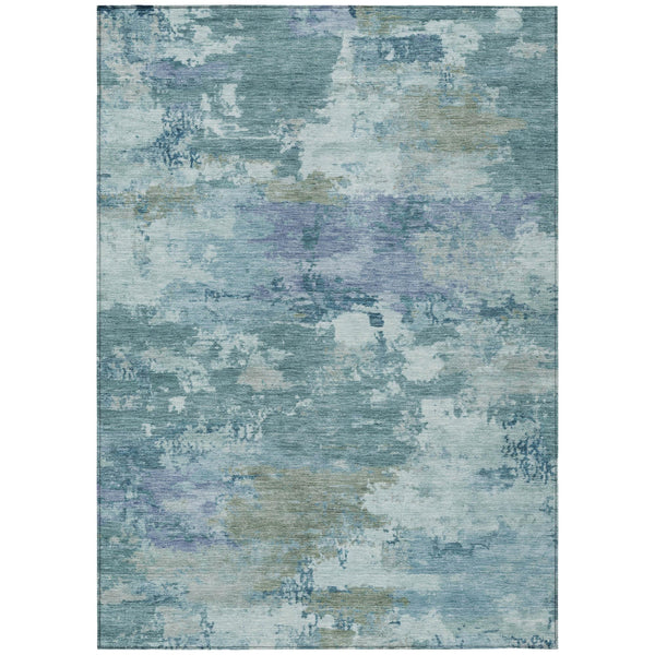 Teal blue abstract area rug with distressed silver pattern, rectangular