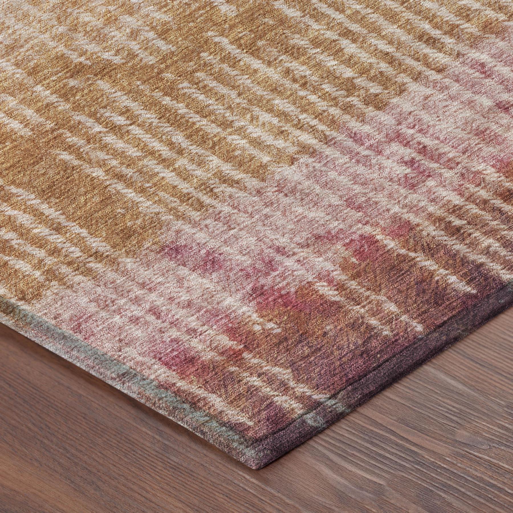 Multicolor abstract area rug featuring gold, pink, and blue tones in a soft, plush fabric, perfect for modern decor.