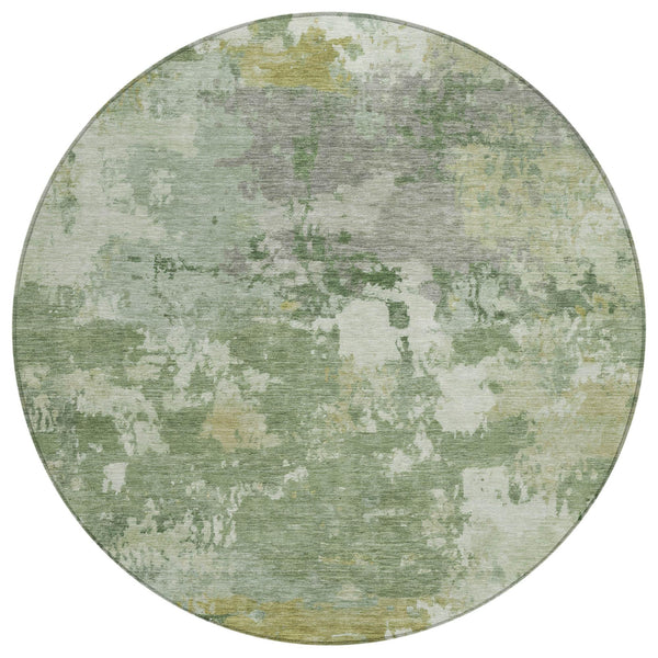 Round abstract washable area rug with green and beige distressed pattern