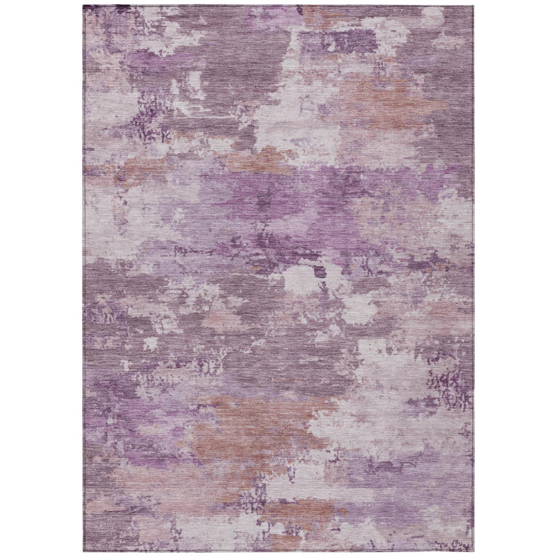 Abstract area rug with plum, lavender, and taupe distressed wash pattern, flat lay