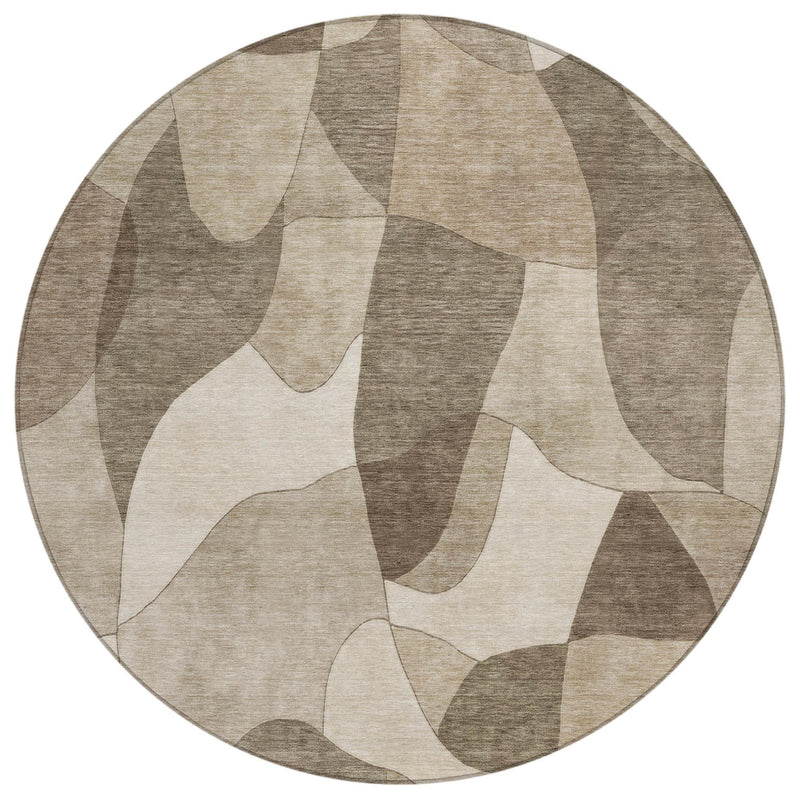Round abstract area rug with beige, tan, and brown layered curves