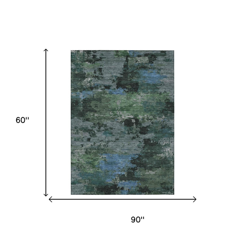 Rectangle 5 x 8 ft abstract area rug with green and graphite blue pattern