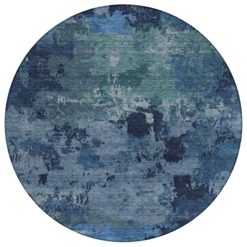 Round blue and navy abstract wash area rug, full top view with mottled design