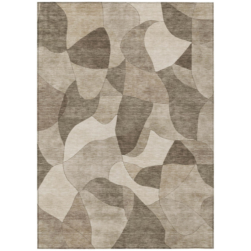 Rectangle abstract area rug with beige, cream, and dark gray connected shapes
