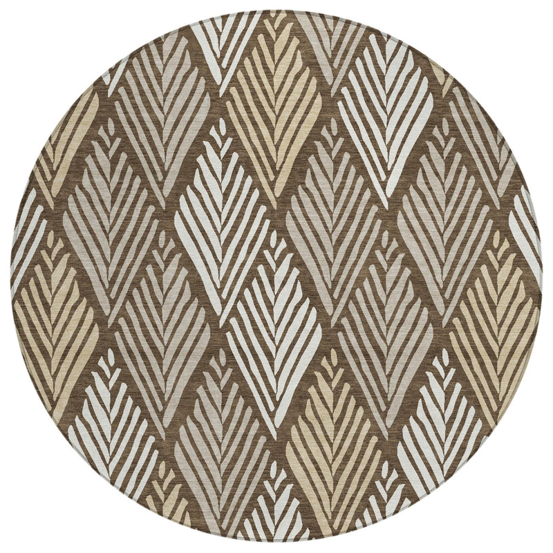 Round area rug with repeating leaf chevron motifs in brown and tan