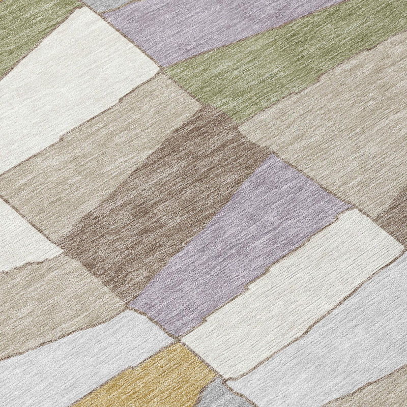 Geometric area rug with multicolor patch blocks in gray, pewter, sage, and yellow