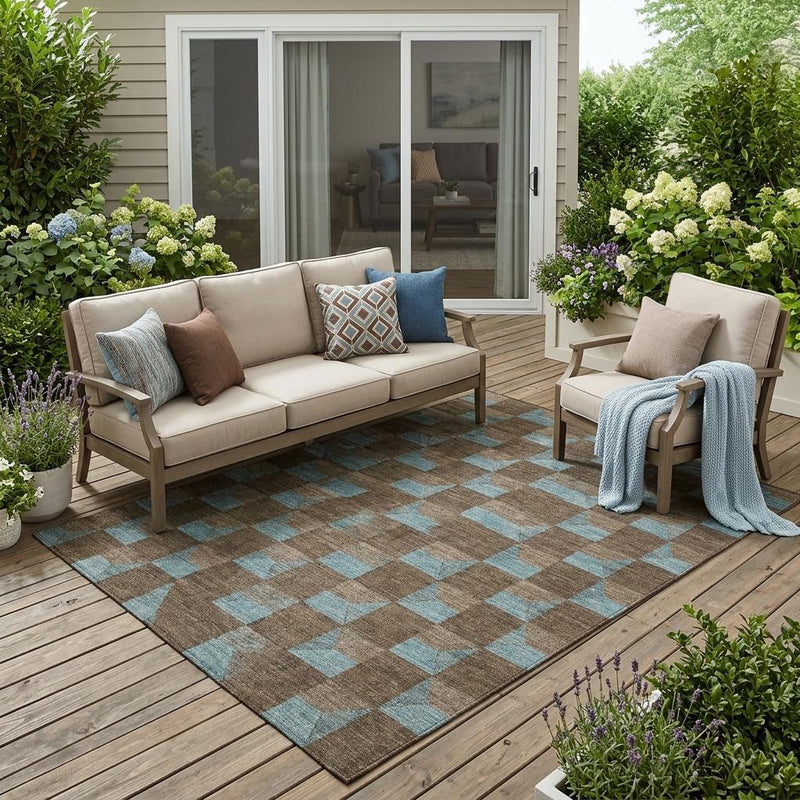 Chocolate and silver geometric area rug with repeating turquoise and brown blocks