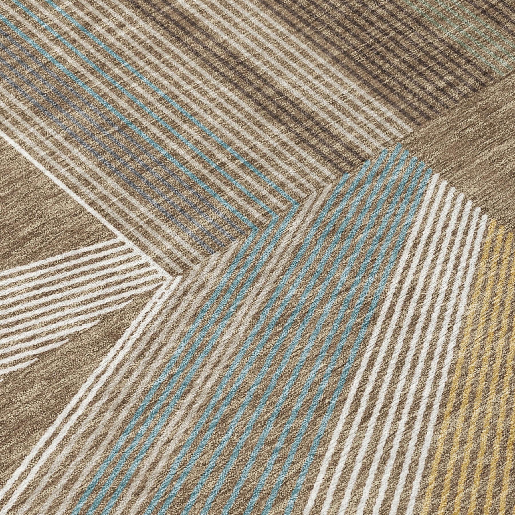 Geometric area rug with brown, gray, white, and blue striped pattern
