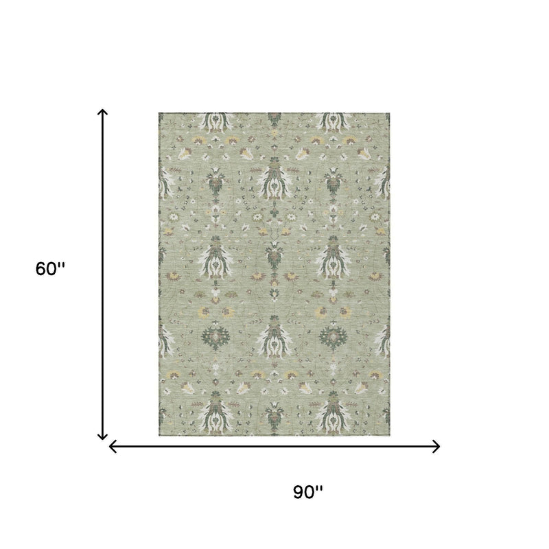 Rectangular sage-green rug with ornate damask and floral motifs