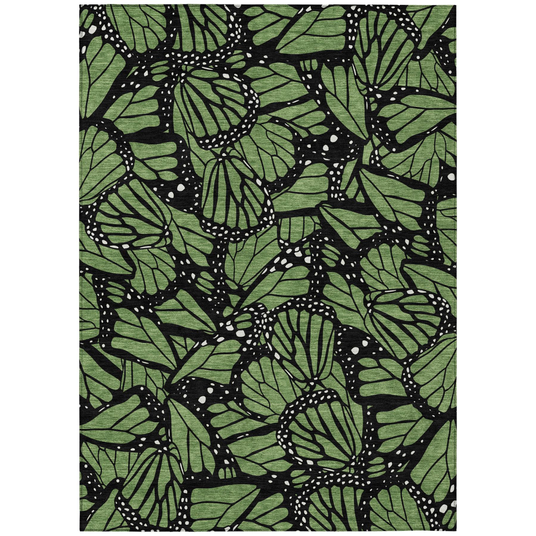 Green and black butterfly animal print area rug with bold leaf-lined motifs