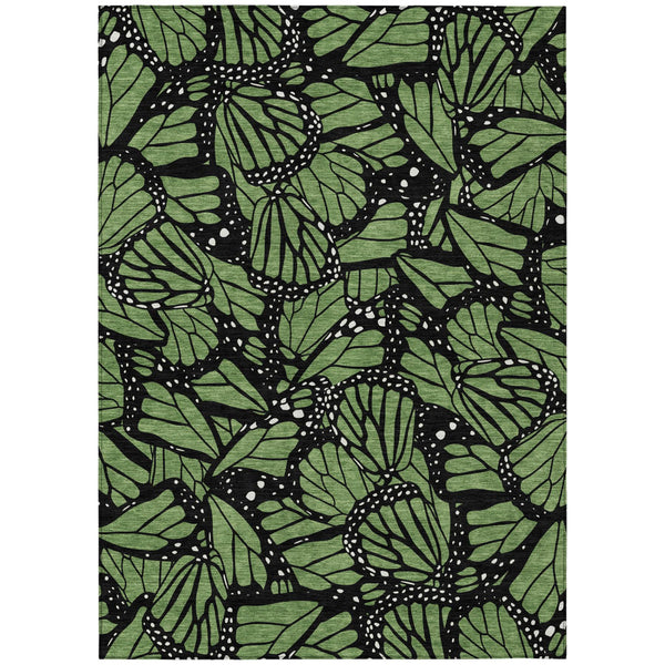 Green and black butterfly animal print area rug with bold leaf-lined motifs