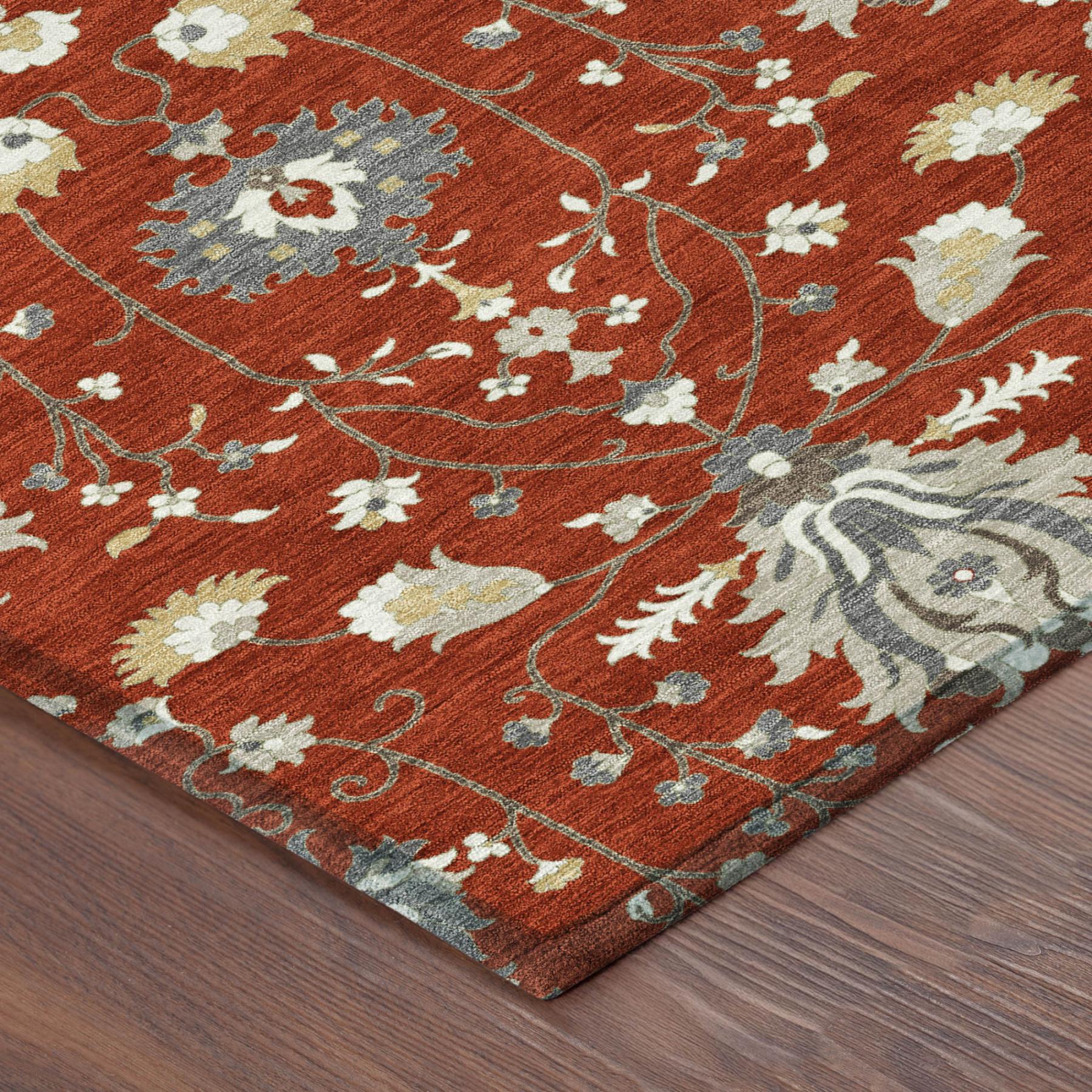 Red oriental area rug corner with beige and gray floral vine pattern and border