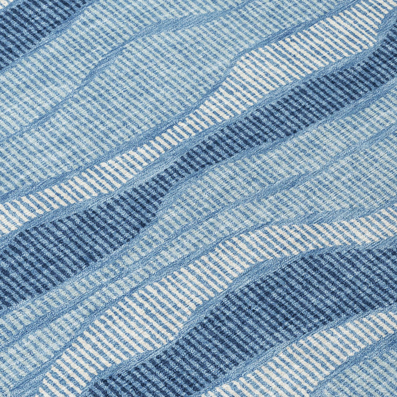 Light and dark blue striped rug with ribbed woven texture