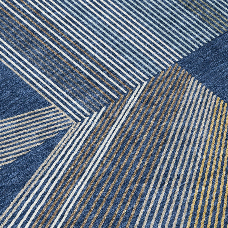 Close-up of navy and light blue striped geometric area rug