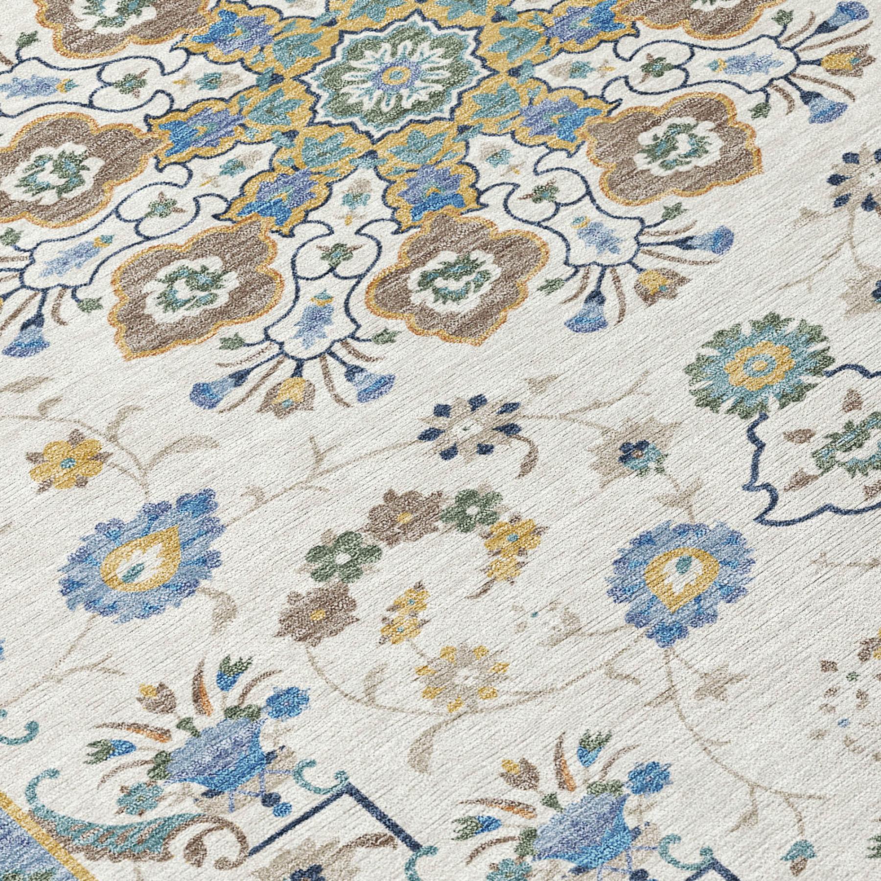 Ivory oriental area rug with blue, green, and gold floral medallion pattern