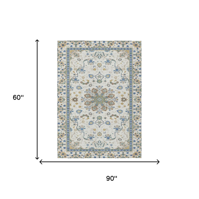 Ivory and blue oriental area rug with decorative border, 60 x 90 in shown
