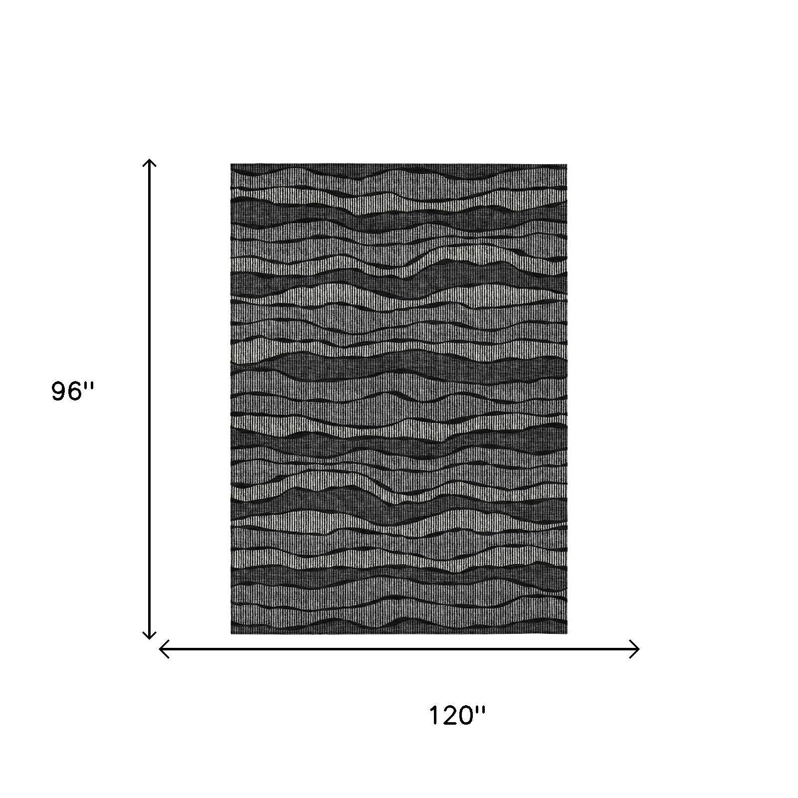 Black and graphite striped area rug with wavy lines, 8 x 10 ft.