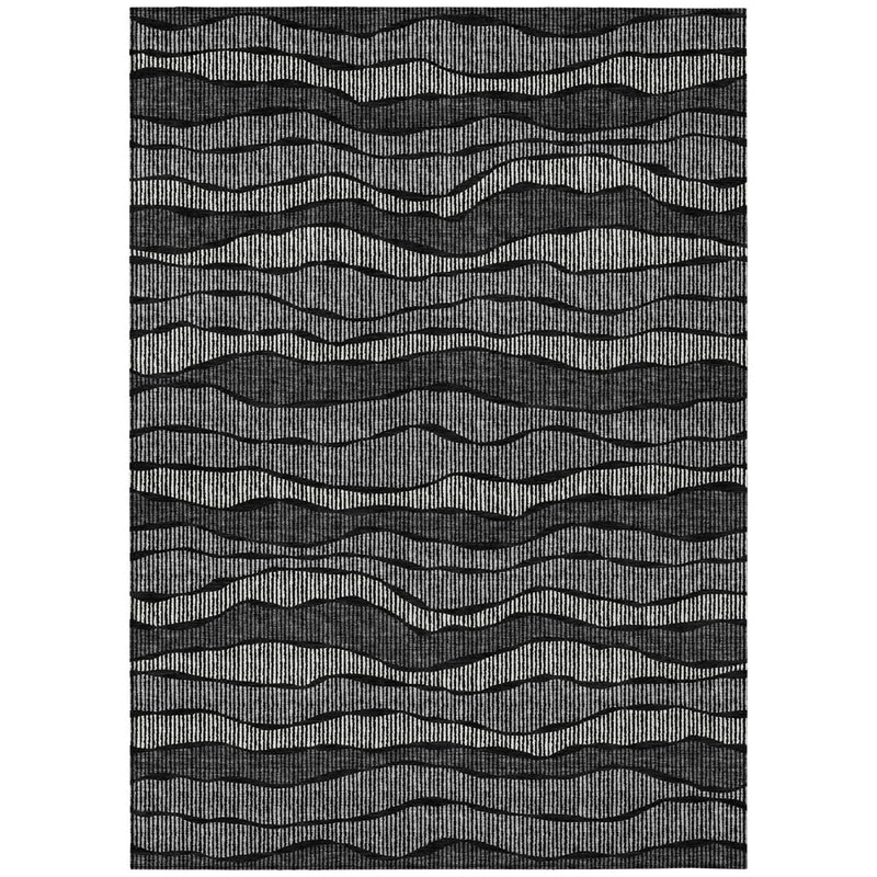 Black and graphite wavy striped area rug, rectangular flat weave.