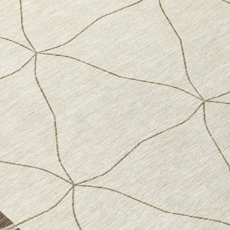Cream textured area rug with tan intersecting diamond line pattern