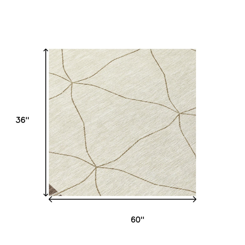 Geometric area rug, 60 in by 36 in, cream with tan line diamonds