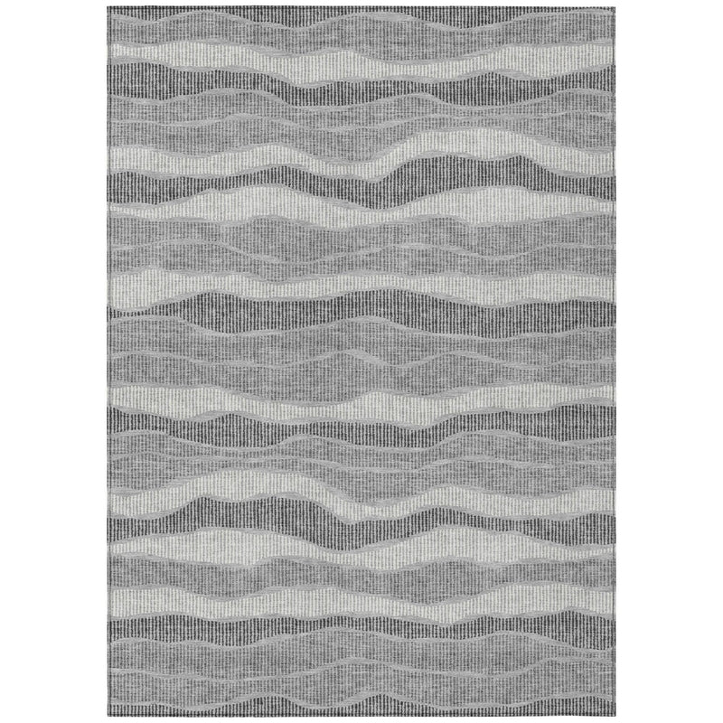 Rectangular gray rug with alternating wavy light and dark stripes