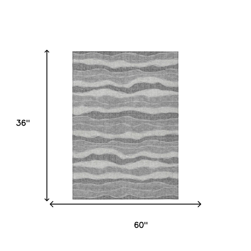 Rug size diagram: 36 in by 60 in, wavy striped gray and pewter