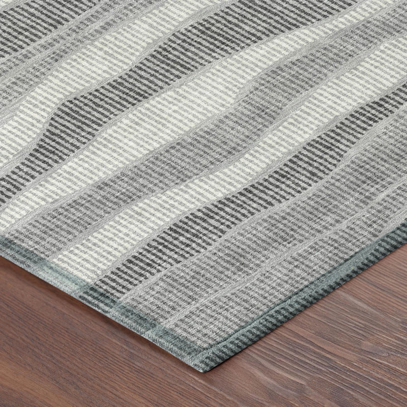 Rectangular area rug in pewter and gray with wavy stripe texture