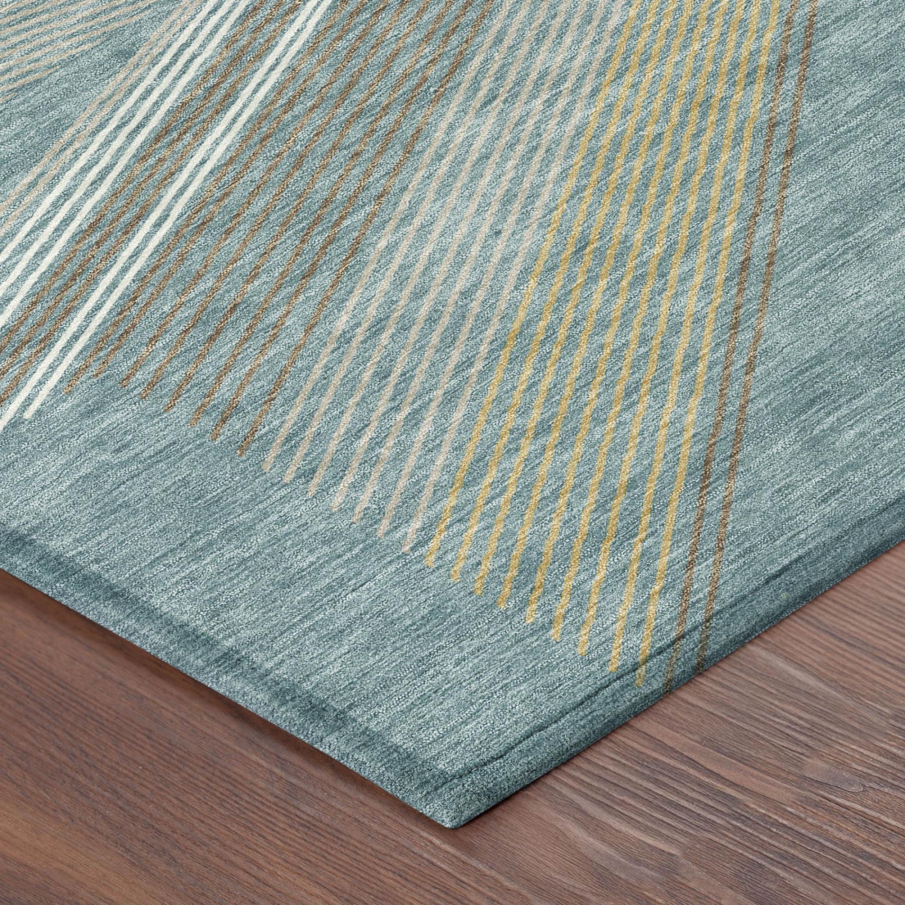 Teal blue geometric area rug corner with woven texture and bound edge